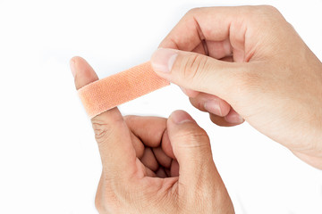 Bandage on the index finger isolate background