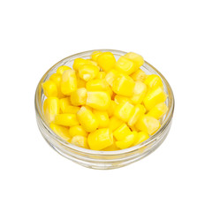 Canned corn in glass bowl. Isolated