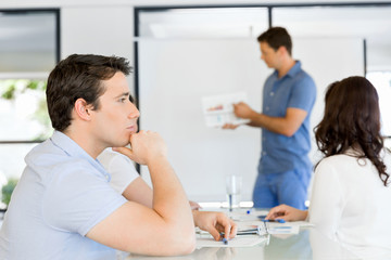 Business meeting with presentation