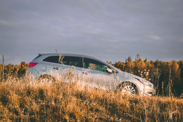 VILNIUS, LITHUANIA - SEPTEMBER 2017 - KIA car against autumn forest background