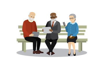 Obraz premium old people or pensioners sitting on bench