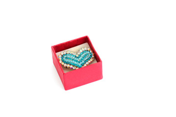 Ring in the form of heart with jewels in a gift box. Happy Valentine's Day. Valuable Jewellery. Isolated with plenty of room for your text.