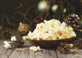 popcorn on the background of Christmas and New Year's decorations, selective focus