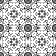 Seamless background pattern with mehndi henna lace buta decoration elements in Indian style.