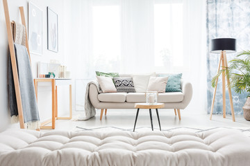 Grey mattress in living room