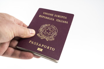 Italian passport on the hand