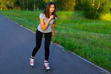 Teen girl roller-skating