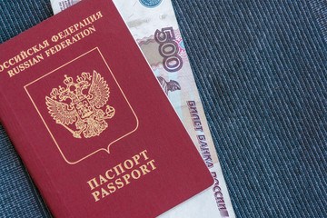 500 rubles in the Russian passport  on a blue textile background