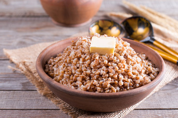 Buckwheat in a bowl. Healthy food. Buckwheat porridge and butter