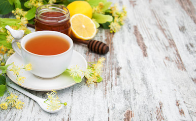 cup of herbal tea with linden flowers