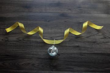 Golden ribbon with disco ball