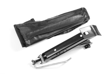 Black car jack isolated over white background.