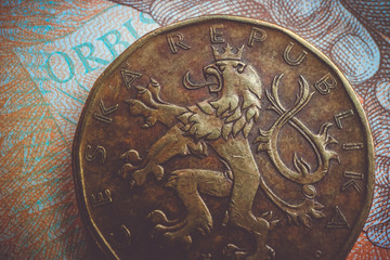 Czech republic currency koruna, banknote pattern background, close up. Photo depicts Czech cash shiny korun czk metal coins, close up, macro view.