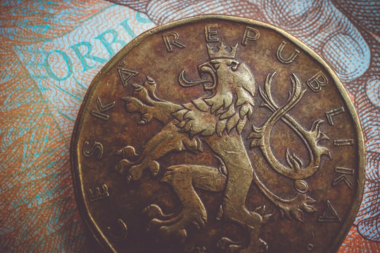 Czech republic currency koruna, banknote pattern background, close up. Photo depicts Czech cash shiny korun czk metal coins, close up, macro view.