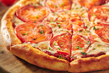 Pizza Restaurant Menu - Delicious Fresh Margarita Pizza with. Pizza on Rustic Wooden Table with Ingredients