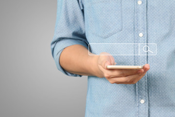 Touch screen smartphone in a hand