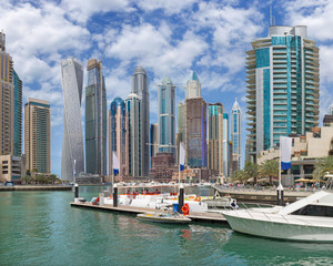 Fototapeta na wymiar Dubai - The skyscrapers of Marina and the yachts.