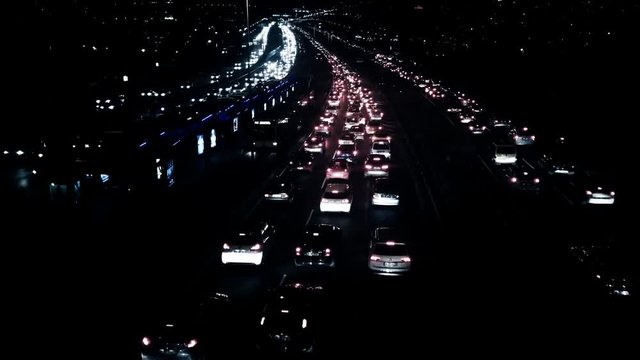 "4k timelapse, view of heavy traffic through bosphoros central business district that is located in the istanbul at night. serial 5