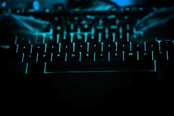 Problem - text on illuminated computer keyboard at night.
