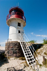 Fototapeta na wymiar little lighthouse on the beach