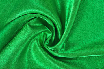 Natural green satin fabric texture background