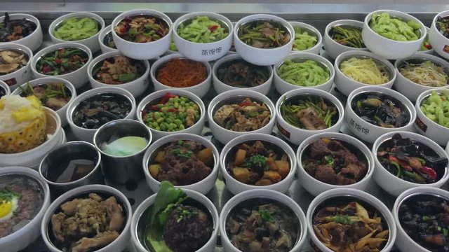 Bowls of traditional Chinese food in restaurant kitchen. Chengdu, Sichuan, China, Asia