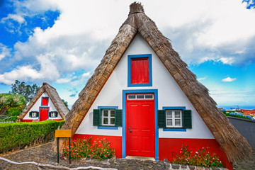 Fototapeta na wymiar Traditional palheiros, the straw-roofed houses of Santana, Madei