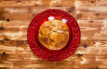 Traditional Italian Christmas cake with chocolate and various xmas decorations,