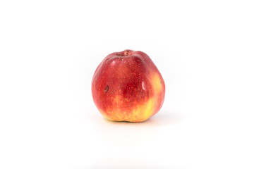a large red ripe apple on white. Studio.