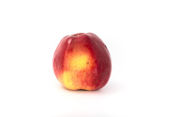 a large red ripe apple on white. Studio.