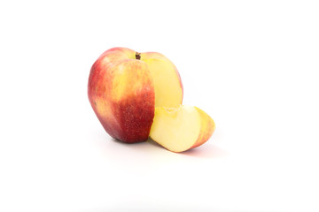 a large red ripe apple on white. Studio.