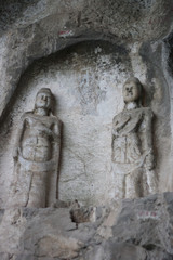 Two stone statue like buddha