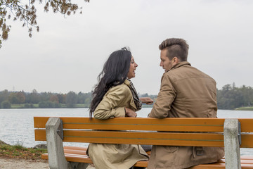amorous couple on a park bench