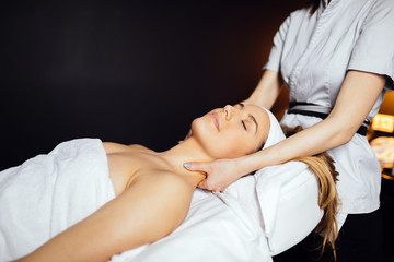 Fototapeta na wymiar Beautiful woman enjoying massage