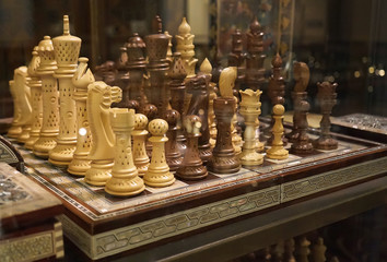 Chess on display through the glass with some bokeh elements