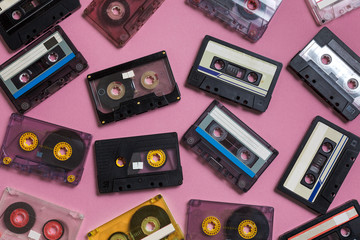 Collection Of Retro Audio Tapes On Lilac Background. Retro Technolody Music Concept