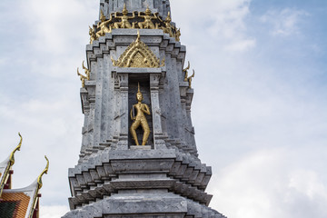 Fototapeta premium Pagoda is in Wat Pho that was named as the temple of the pagoda or chedi that are decorated with yellow glaze or glazed tiles or dark blue