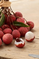 litchi, lichee, lychee, or lichi, Litchi chinensis on old rustic wood background with copy space