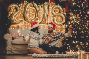 Couple celebrating New Year at home