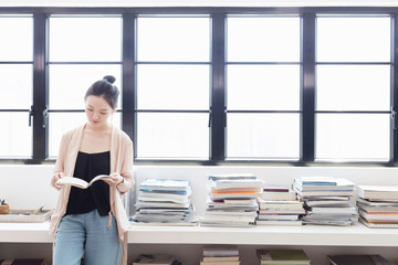 Student researching in library