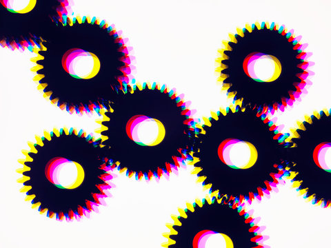Engineering cog wheels connected to produce power and motion