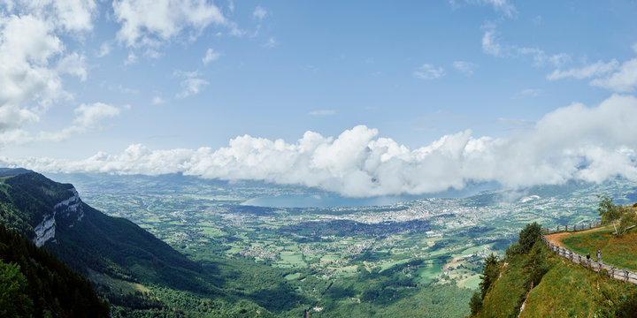 Distant view of Aix les Bains and lake Bourget from top of Mount Revard, French Alps, France