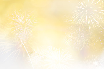 Soft gold yellow & white blur bokeh background with firework for text insertion, decoration or...
