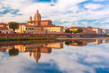 Quay of the river Arno in Florence and church San Frediano in Cestello in the sunny day, Tuscany, Italy