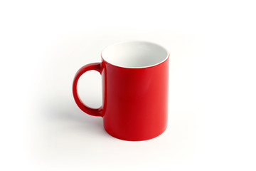 Empty red mug on a white background.