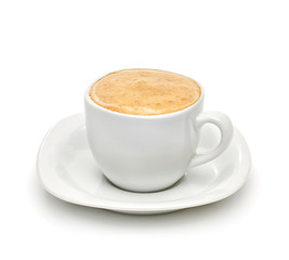 Capuccino in porcelain cup on white background including clipping path