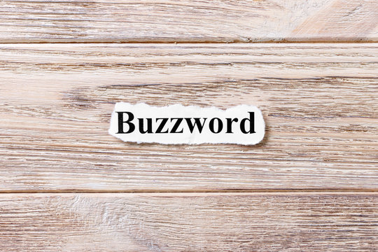 Buzzword of the word on paper. concept. Words of Buzzword on a wooden background