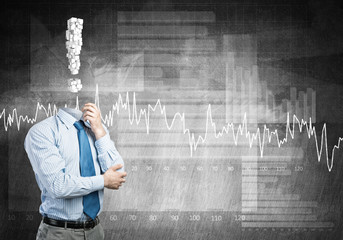 Pensive headless businessman