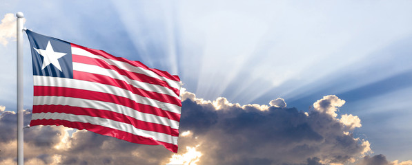 Liberia flag on blue sky. 3d illustration