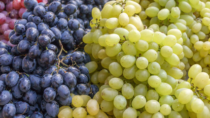 Fresh white, pink and black grapes